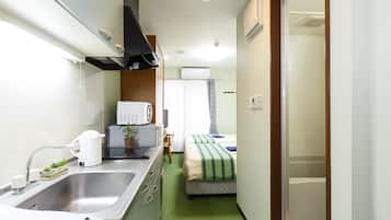 Quarto duplo, 2 quartos | Escrivaninha, Wi-Fi de cortesia, roupa de cama