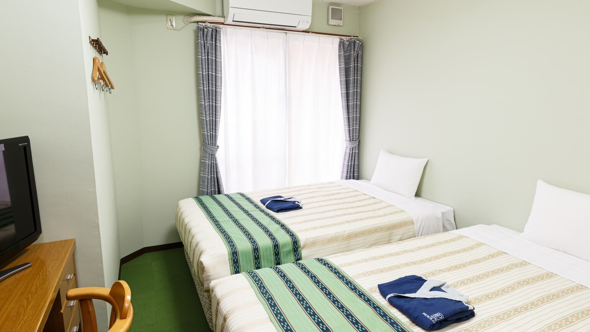 Desk, free WiFi, bed sheets