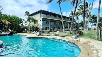 Outdoor pool, open 9:00 AM to 8:00 PM, pool umbrellas, pool loungers