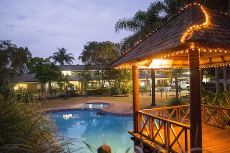 Outdoor pool, pool umbrellas, sun loungers