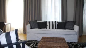 Apartment, 1 Bedroom, Kitchen | Living room | Flat-screen TV