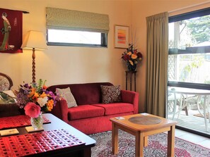 Deluxe-Apartment, 1 Schlafzimmer, Gartenblick | Hochwertige Bettwaren, Daunenbettdecken, individuell dekoriert