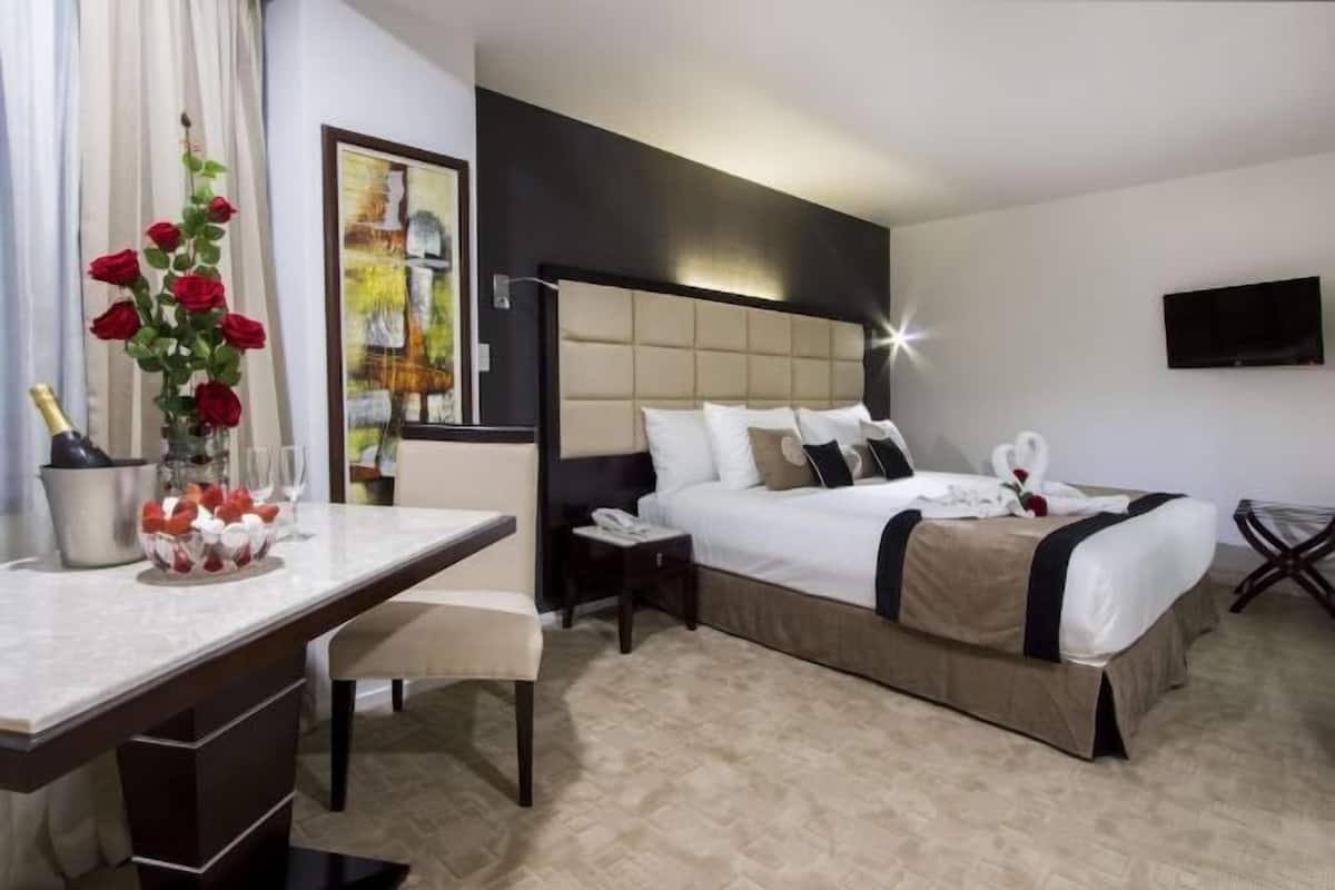 Premium bedding, pillowtop beds, in-room safe, blackout drapes