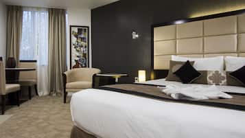 Premier King Room | Premium bedding, pillowtop beds, in-room safe, blackout drapes