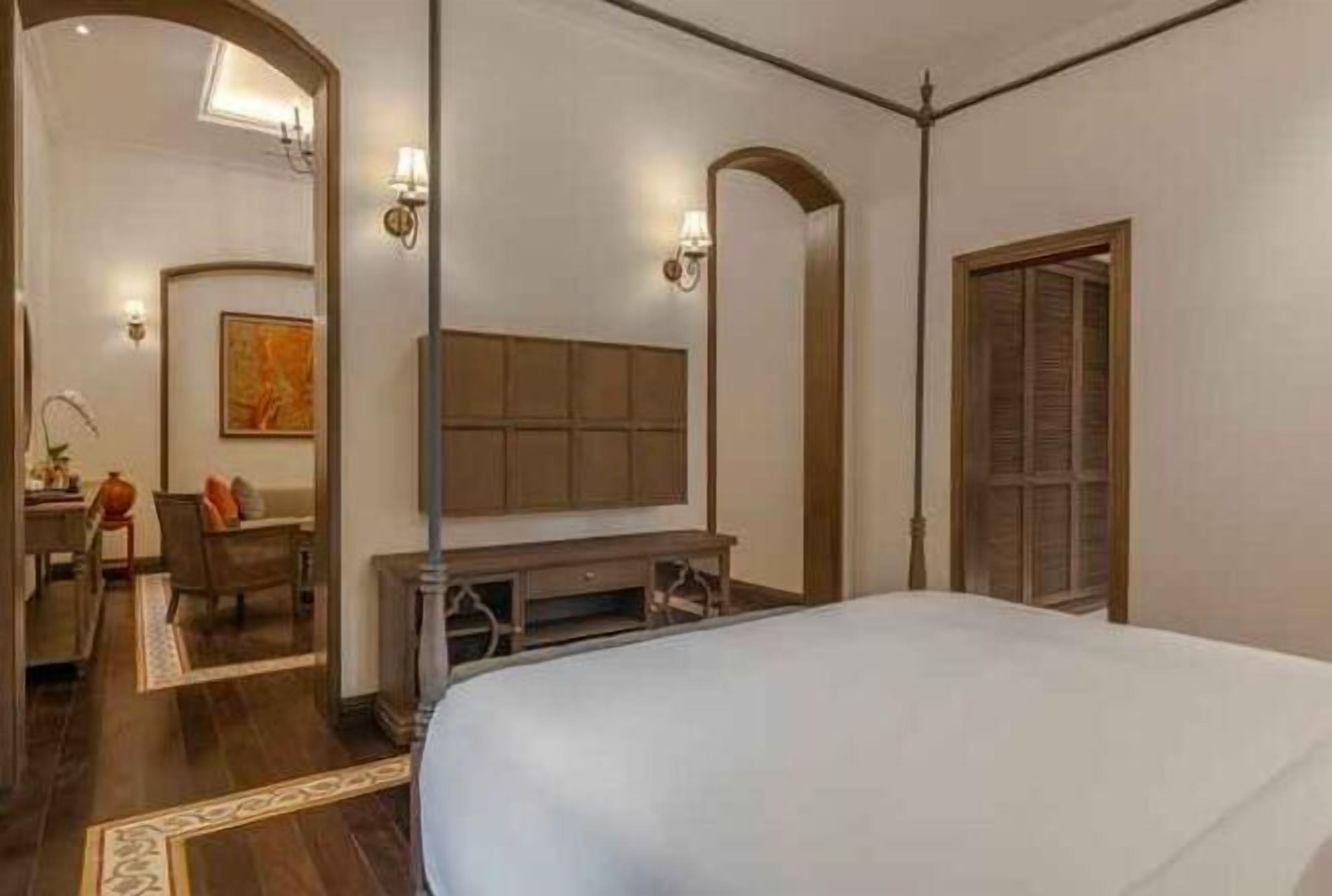 Egyptian cotton sheets, down duvets, pillow-top beds, minibar