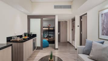 1 King Bed and Bunk Bed, Family Room with Bathtub and Living Area