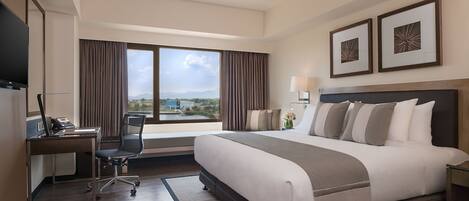 Chambre Deluxe | Minibar, coffres-forts dans les chambres, bureau, rideaux occultants