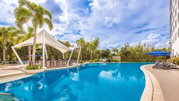 Outdoor pool, open 7:00 AM to 8:00 PM, pool umbrellas, sun loungers