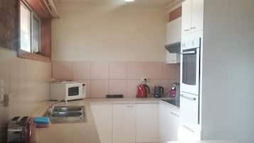 Fridge, microwave, coffee/tea maker, electric kettle