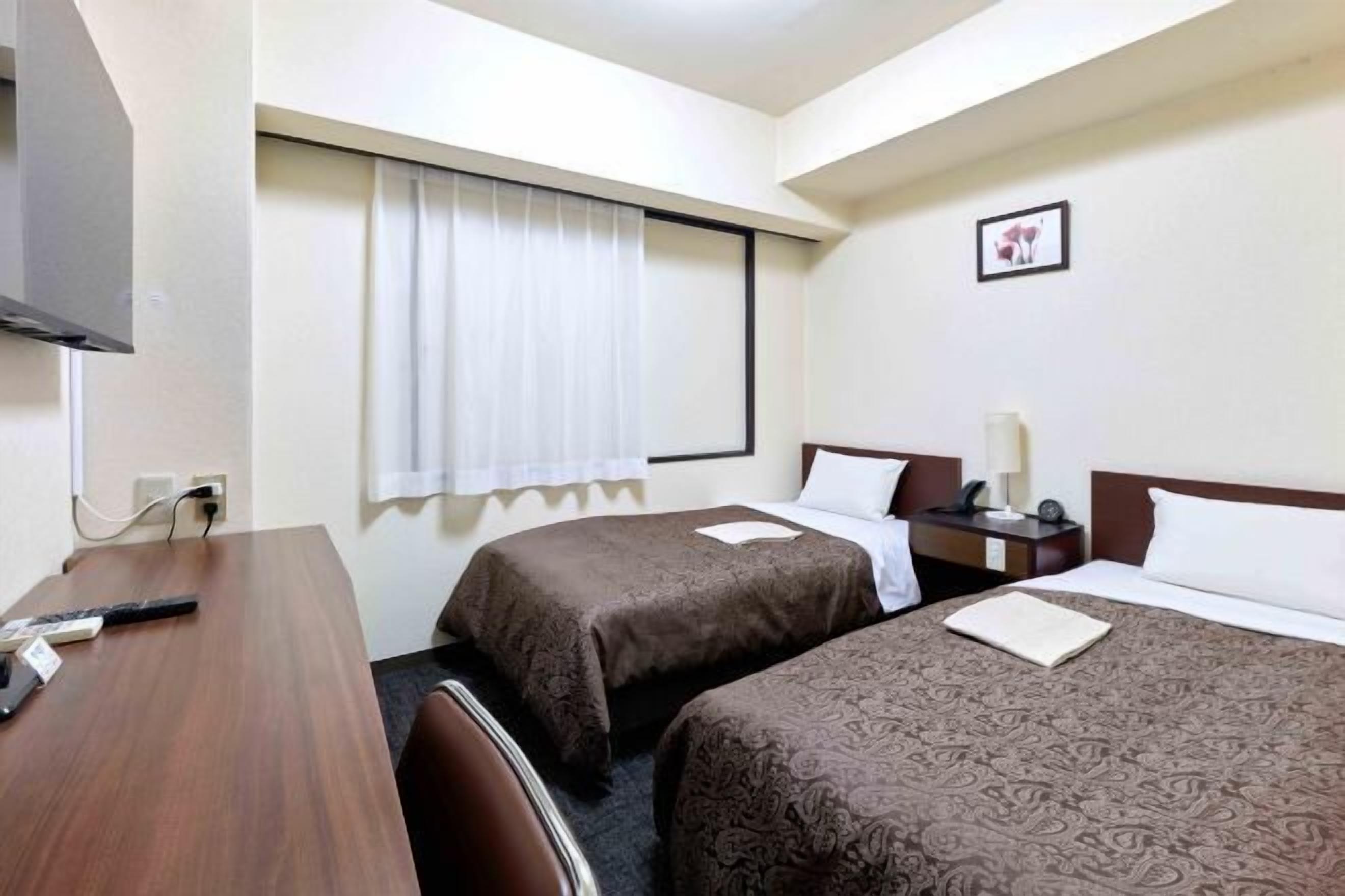 Desk, blackout drapes, soundproofing, free WiFi