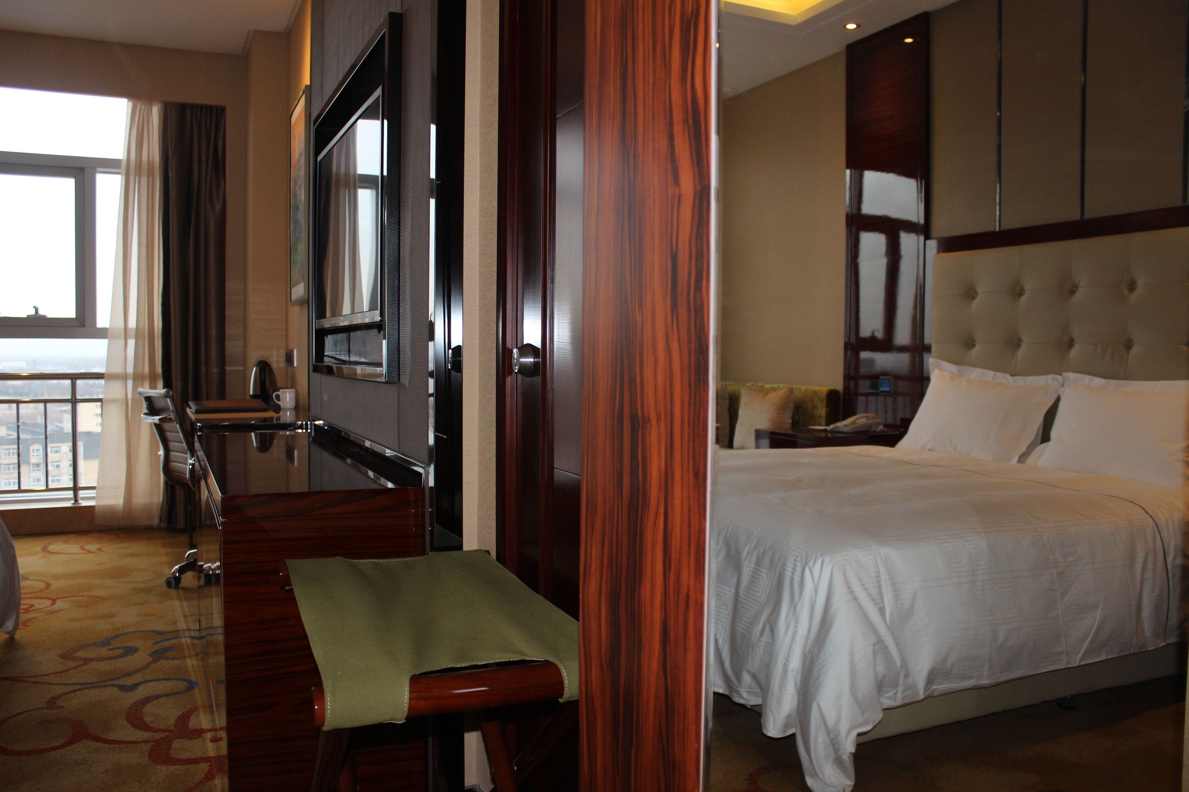 desk, blackout curtains, iron/ironing board, rollaway beds