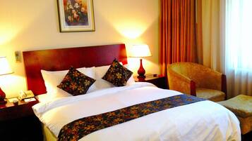 Suíte, 1 cama de casal | Frigobar, cofres nos quartos, Wi-Fi de cortesia