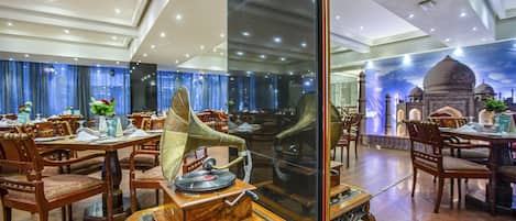 3 restaurants, breakfast, lunch, dinner served; Indian cuisine