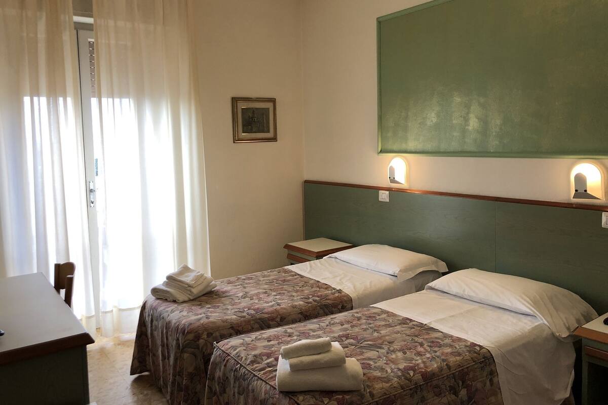 Triple Room, Garden View | In-room safe, desk, WiFi (free), bed sheets