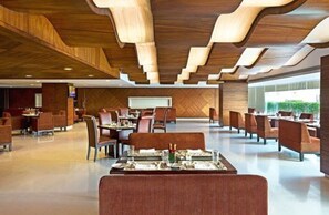 2 restaurants, breakfast, lunch, dinner served; Indian cuisine  - The Deltin Hotel (Daman)