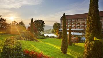 Experience the serene atmosphere of this traditional hotel, surrounded by beautifully maintained gardens and a picturesque countryside view.