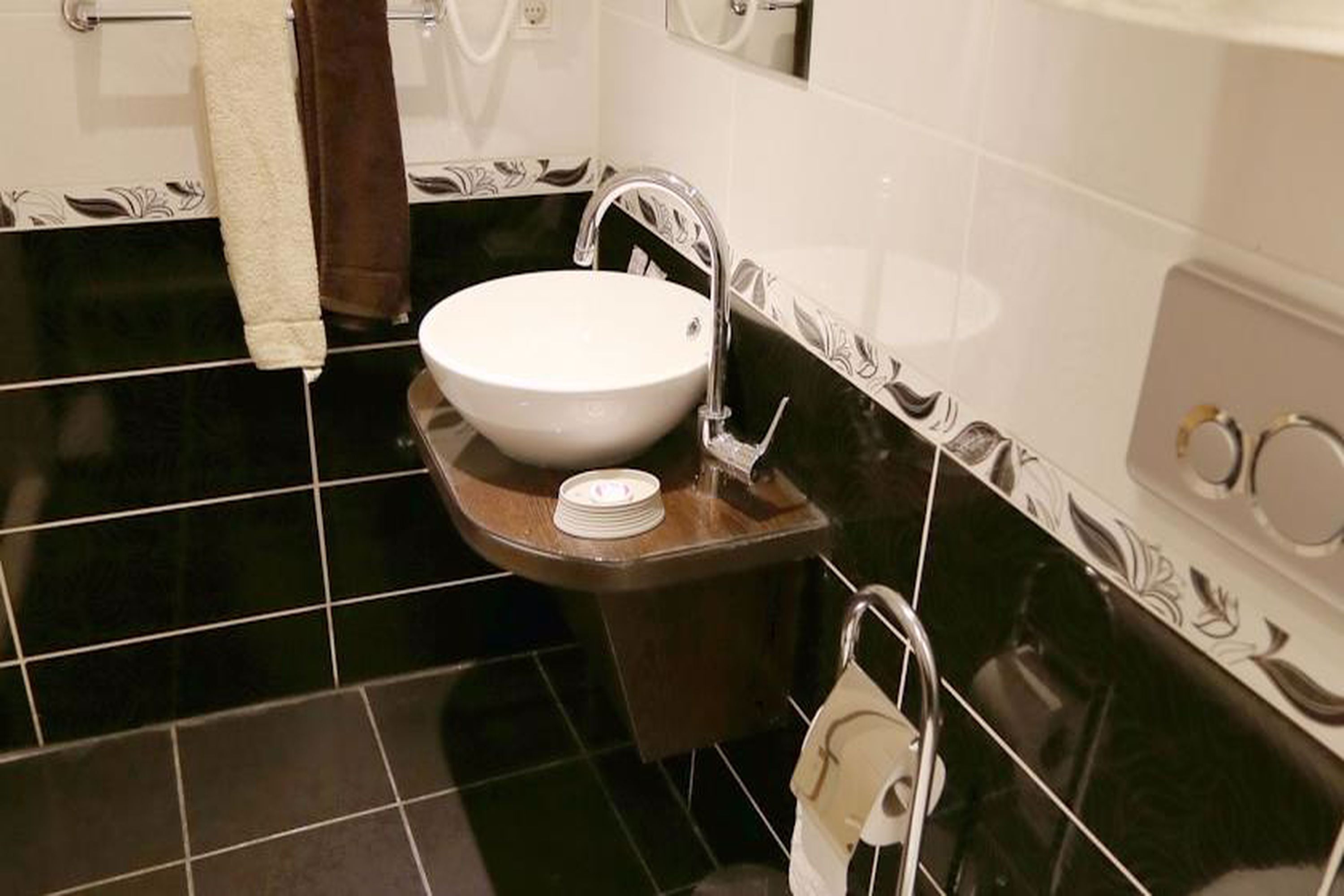 economy room | bathroom | shower, free toiletries, hair dryer, slippers