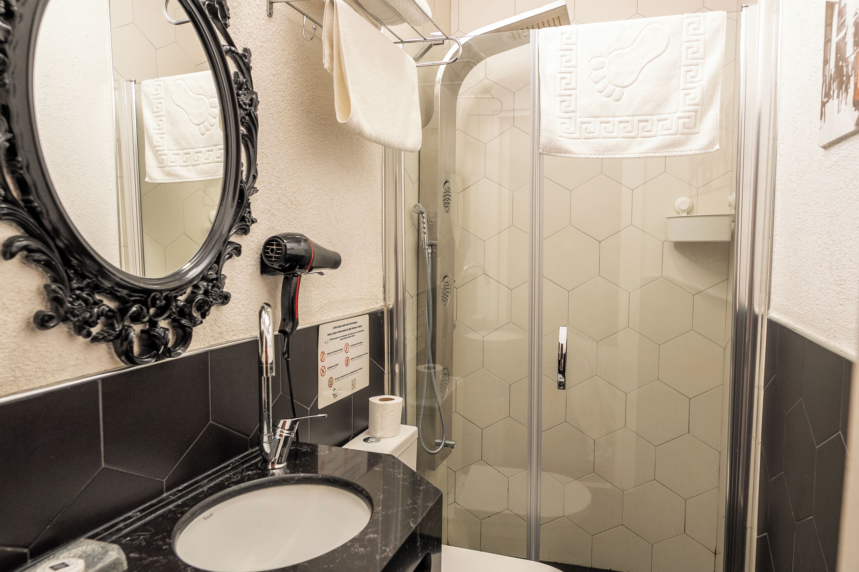 standard room | bathroom | shower, free toiletries, hair dryer, slippers