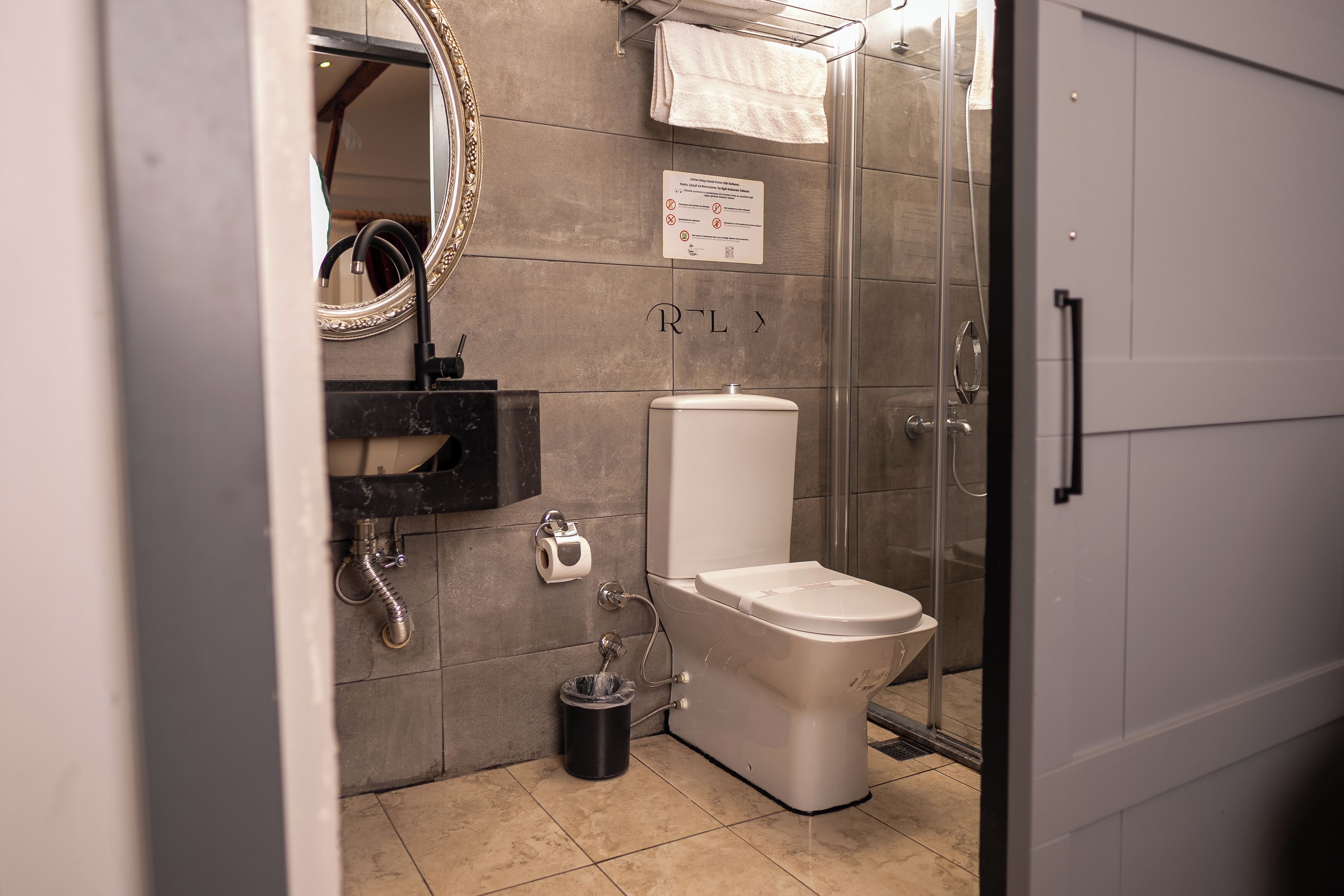 standard room | bathroom | shower, free toiletries, hair dryer, slippers