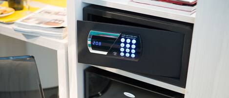A digital lock with a keypad and a display showing the number 208.