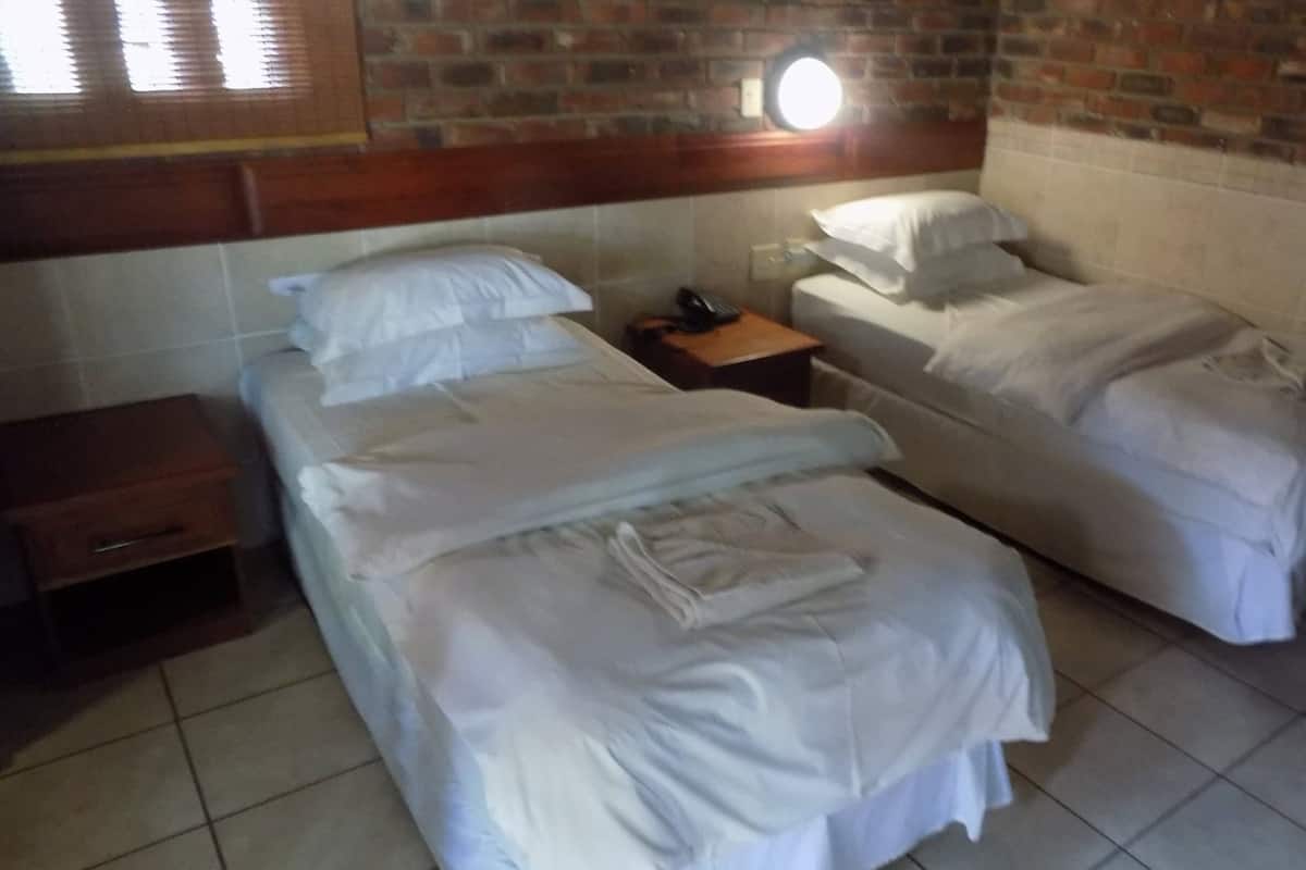 Standard Double or Twin Room | In-room safe, desk, laptop workspace, iron/ironing board