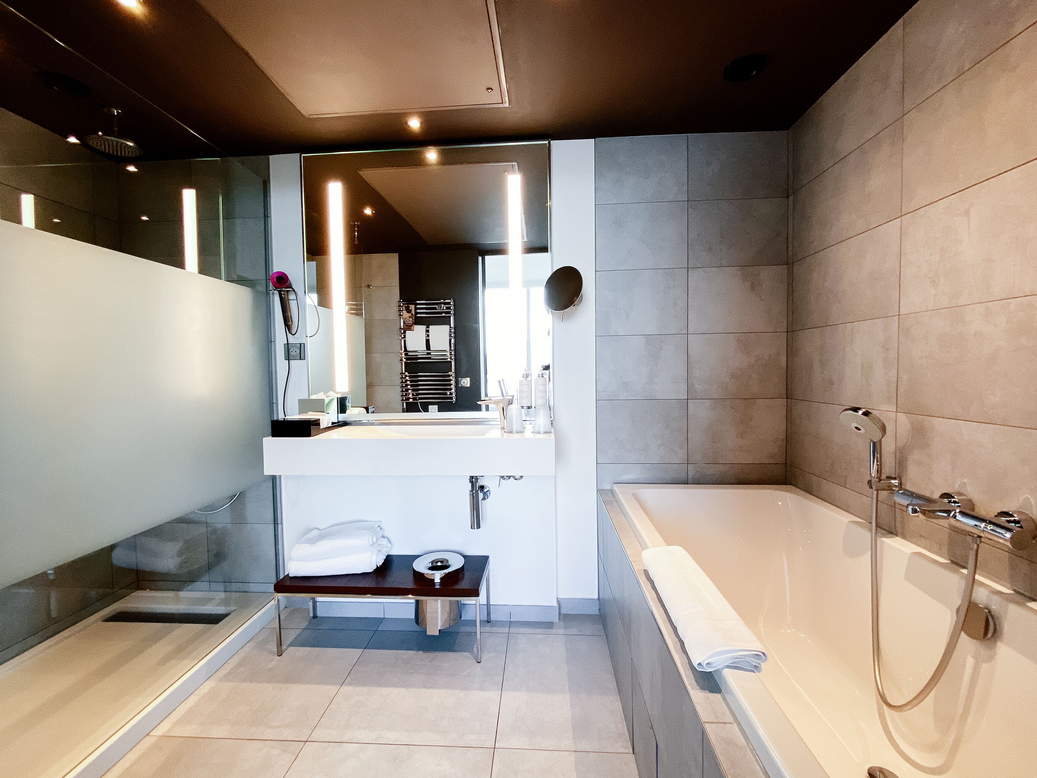 eco-friendly toiletries, hair dryer, bathrobes, slippers