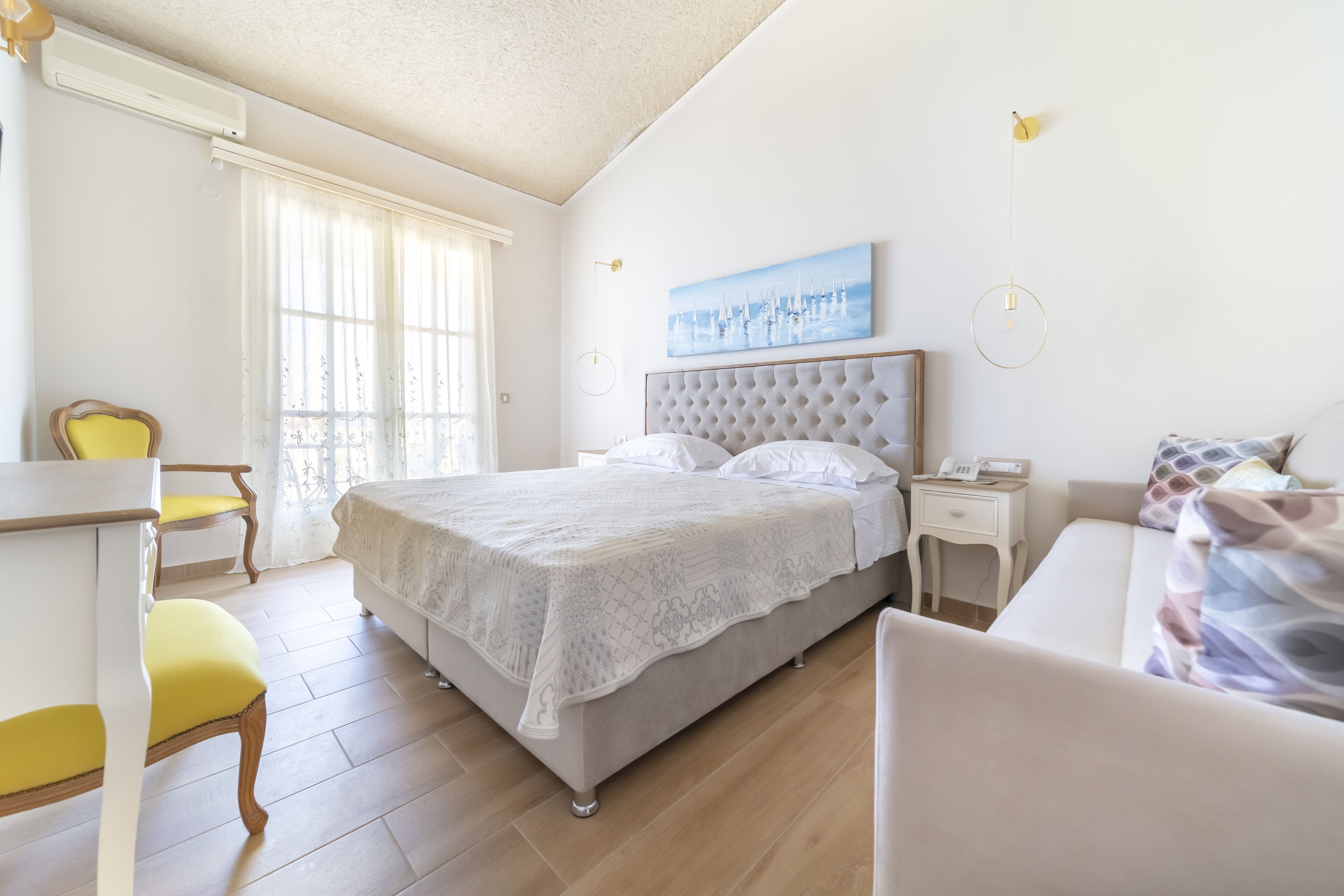 Junior Suite, Sea View | Minibar, in-room safe, free WiFi, bed sheets