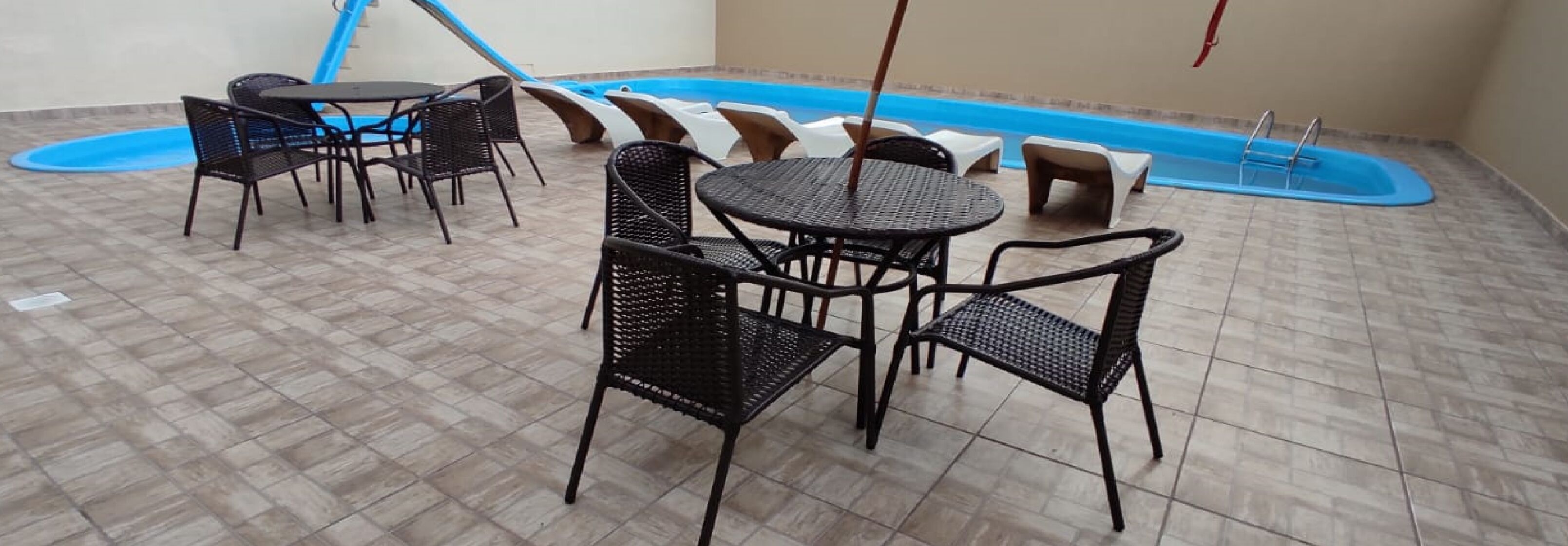 outdoor pool, open 10 am to 10 pm, pool loungers