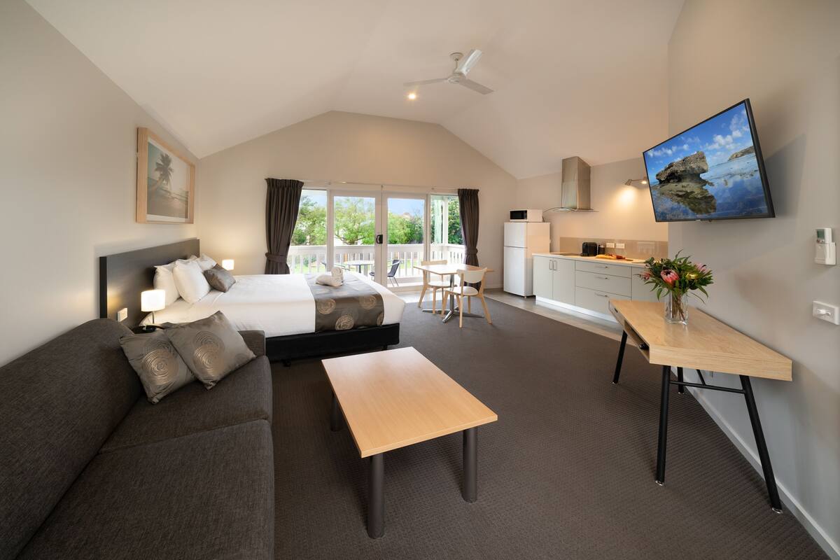 Camas con pillow-top y espacio para trabajar con laptop