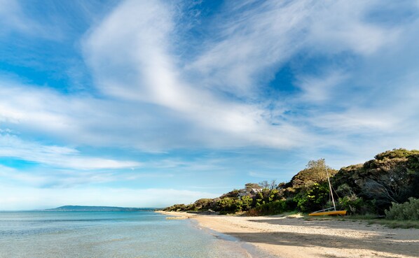 Beach nearby, beach umbrellas, beach towels