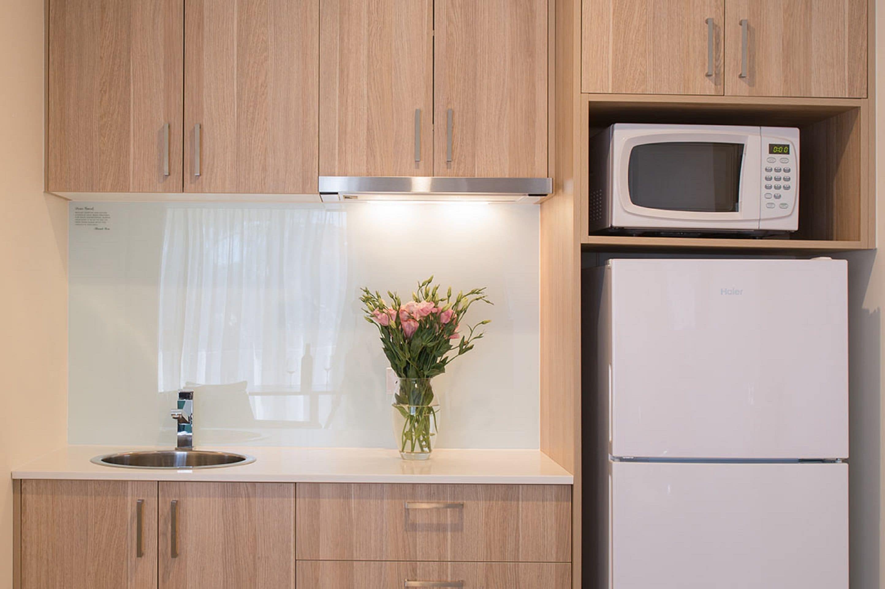 pillow-top beds, laptop workspace, blackout curtains, iron/ironing board