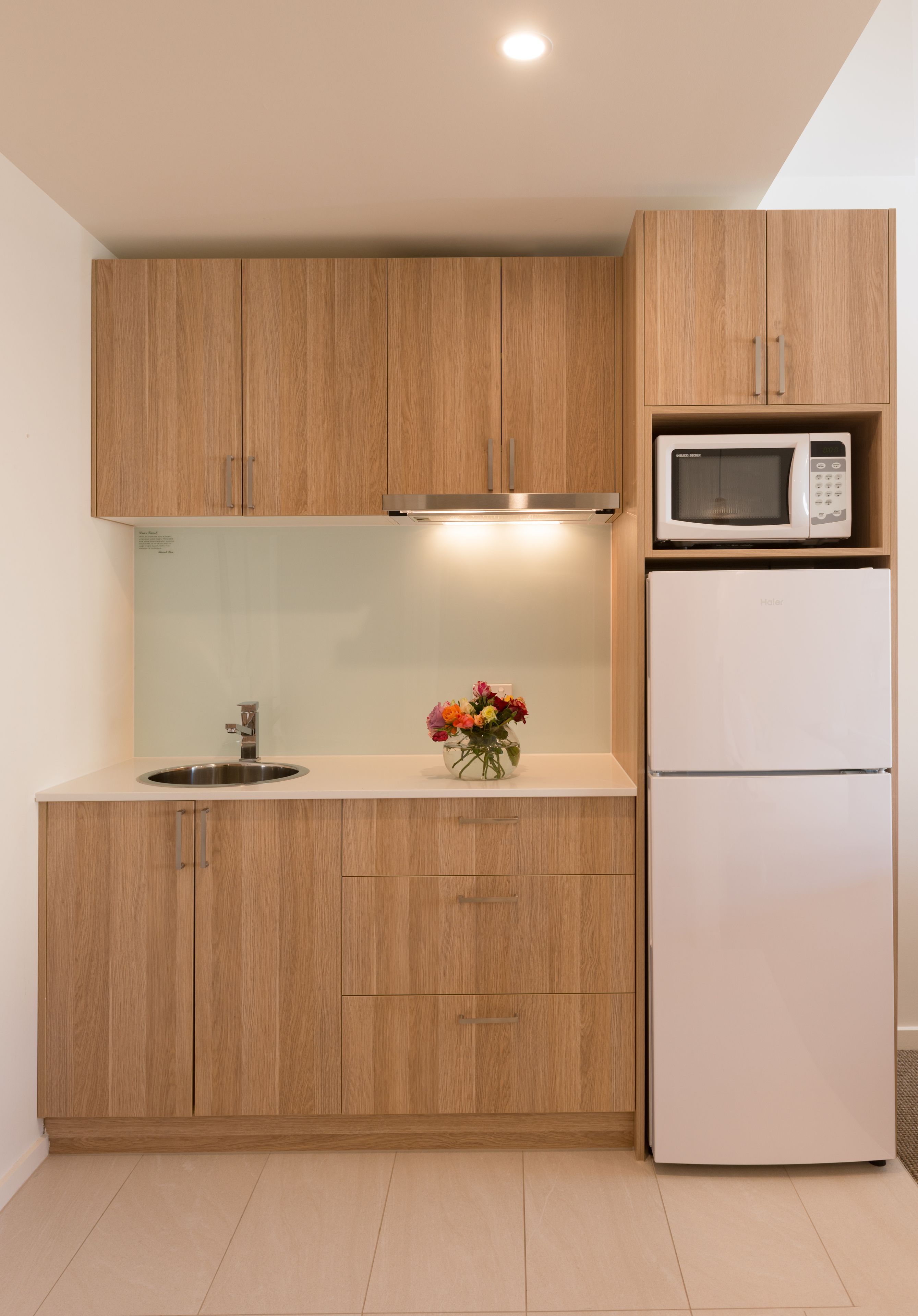 deluxe suite with free parking and wifi | private kitchenette | full-sized fridge, microwave, espresso maker, coffee/tea maker