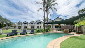 Outdoor pool, pool umbrellas, pool loungers