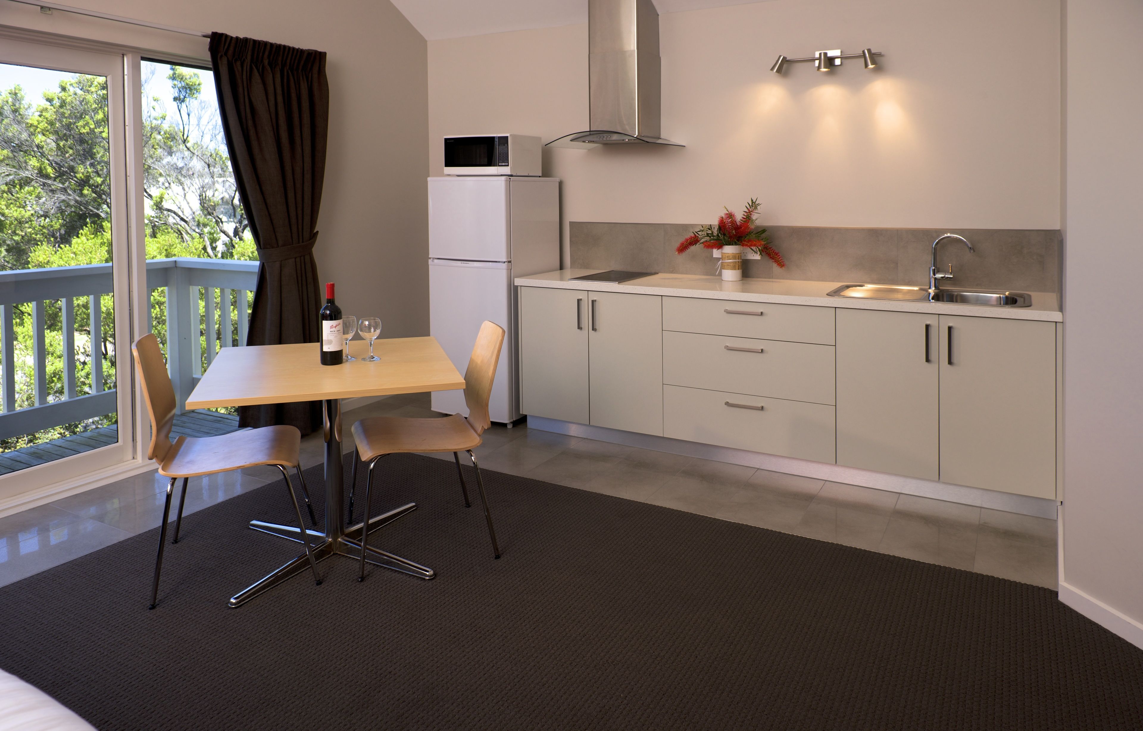 luxury king spa studio parking & wifi | private kitchenette | full-sized fridge, microwave, espresso maker, coffee/tea maker