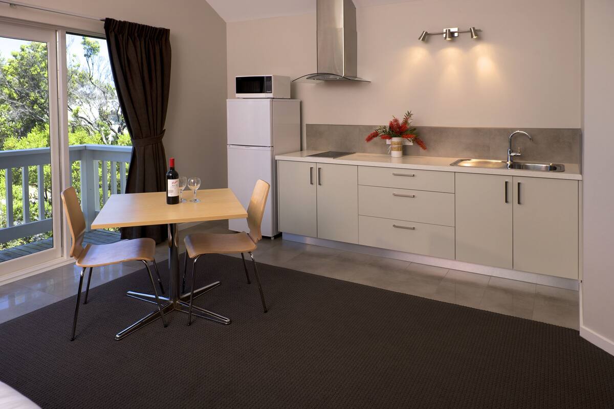 luxury king spa studio parking & wifi | private kitchenette | full-sized fridge, microwave, espresso maker, coffee/tea maker