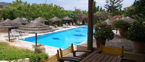 Seasonal outdoor pool, pool umbrellas, sun loungers