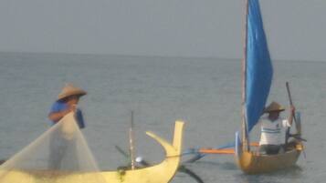 Two boats on calm water.