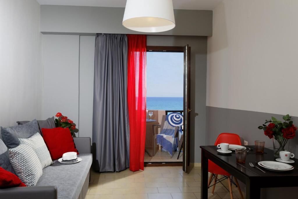 apartment, sea view | living area | 27-inch flat-screen tv with digital channels, tv