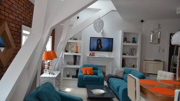Suite | Wohnzimmer | LED-Fernseher, Kamin, DVD-Player
