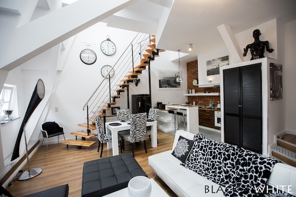 Apartamento, 2 quartos | Cozinha privada | Geladeira grande, micro-ondas, cooktop, lava-louças