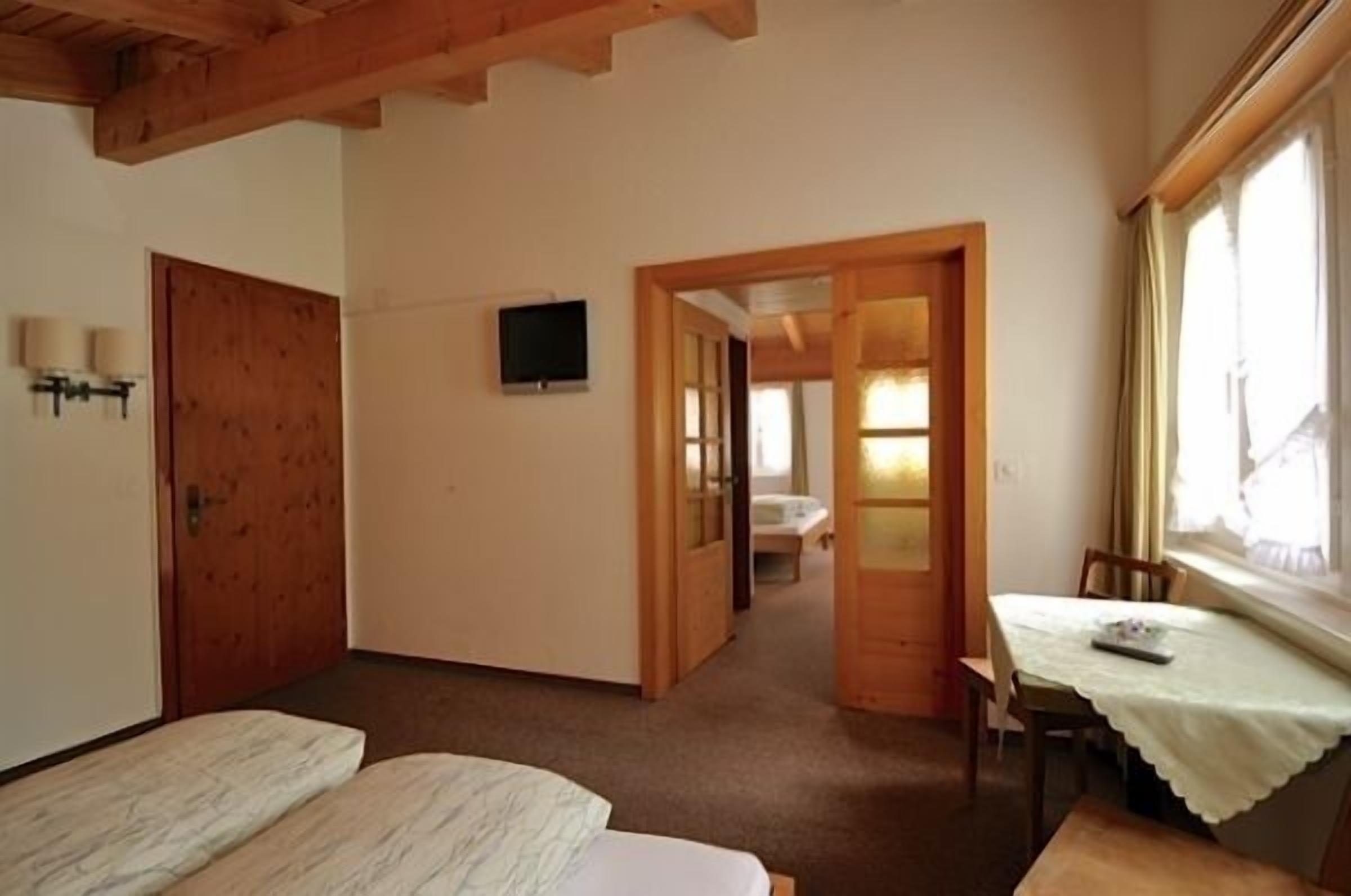 quadruple room | living area | plasma tv