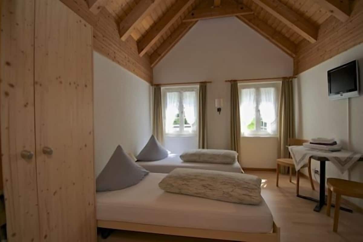Double Room, Shared Bathroom | Individually furnished, blackout drapes, free cribs/infant beds