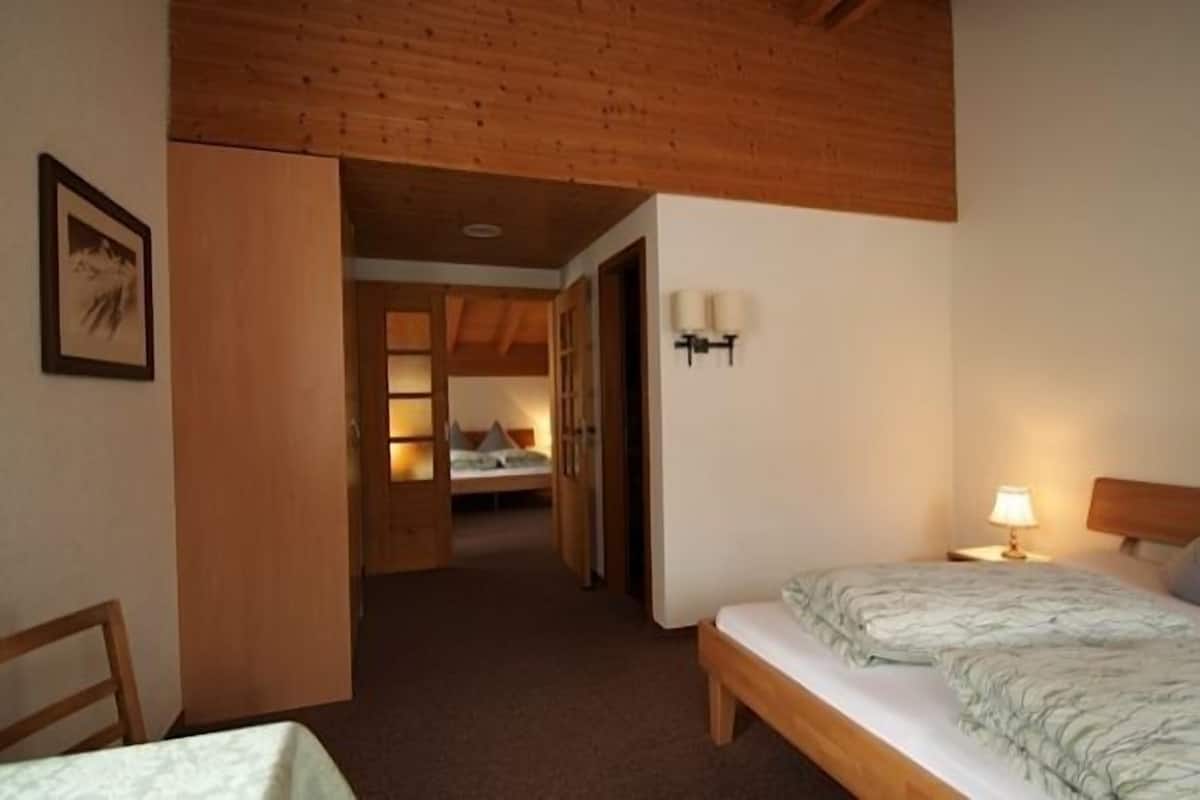 Quadruple Room | Living area | Plasma TV