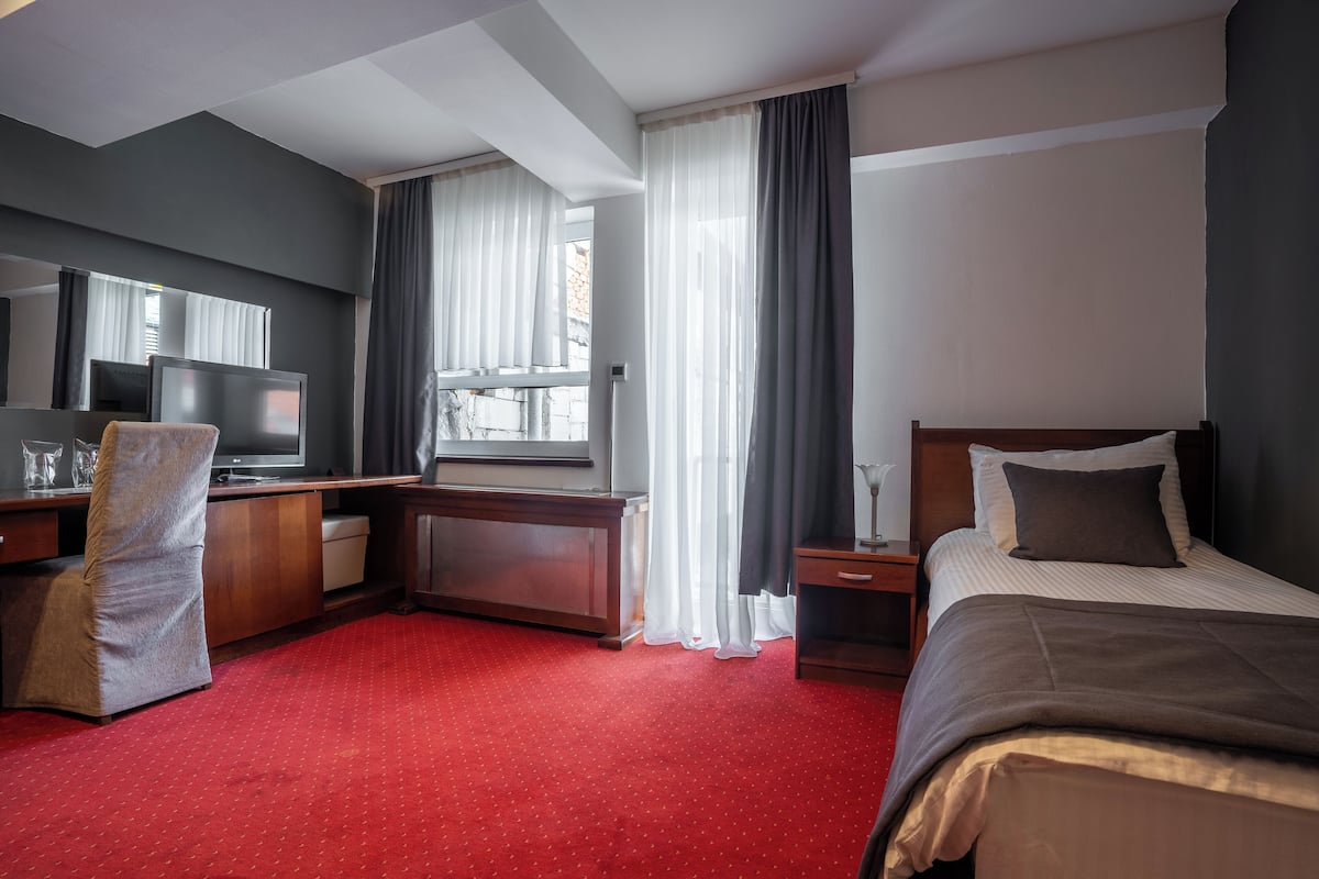 Minibar, desk, laptop workspace, blackout curtains
