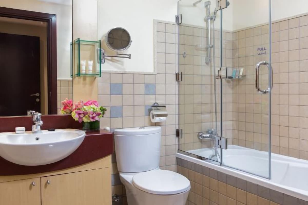 Bathroom | Combined shower/bathtub, deep-soaking bathtub, designer toiletries
