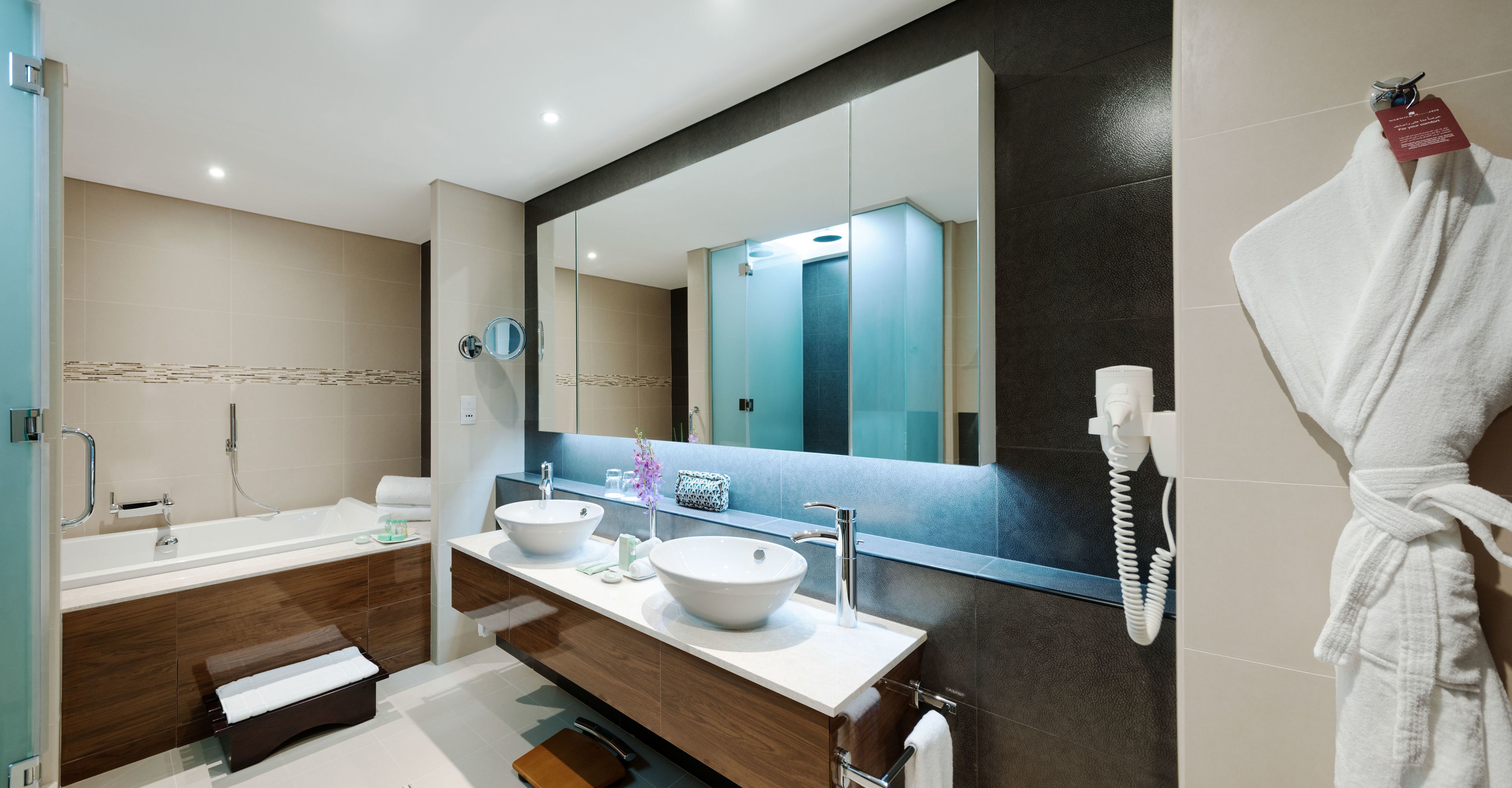 combined shower/bathtub, deep-soaking bathtub, designer toiletries