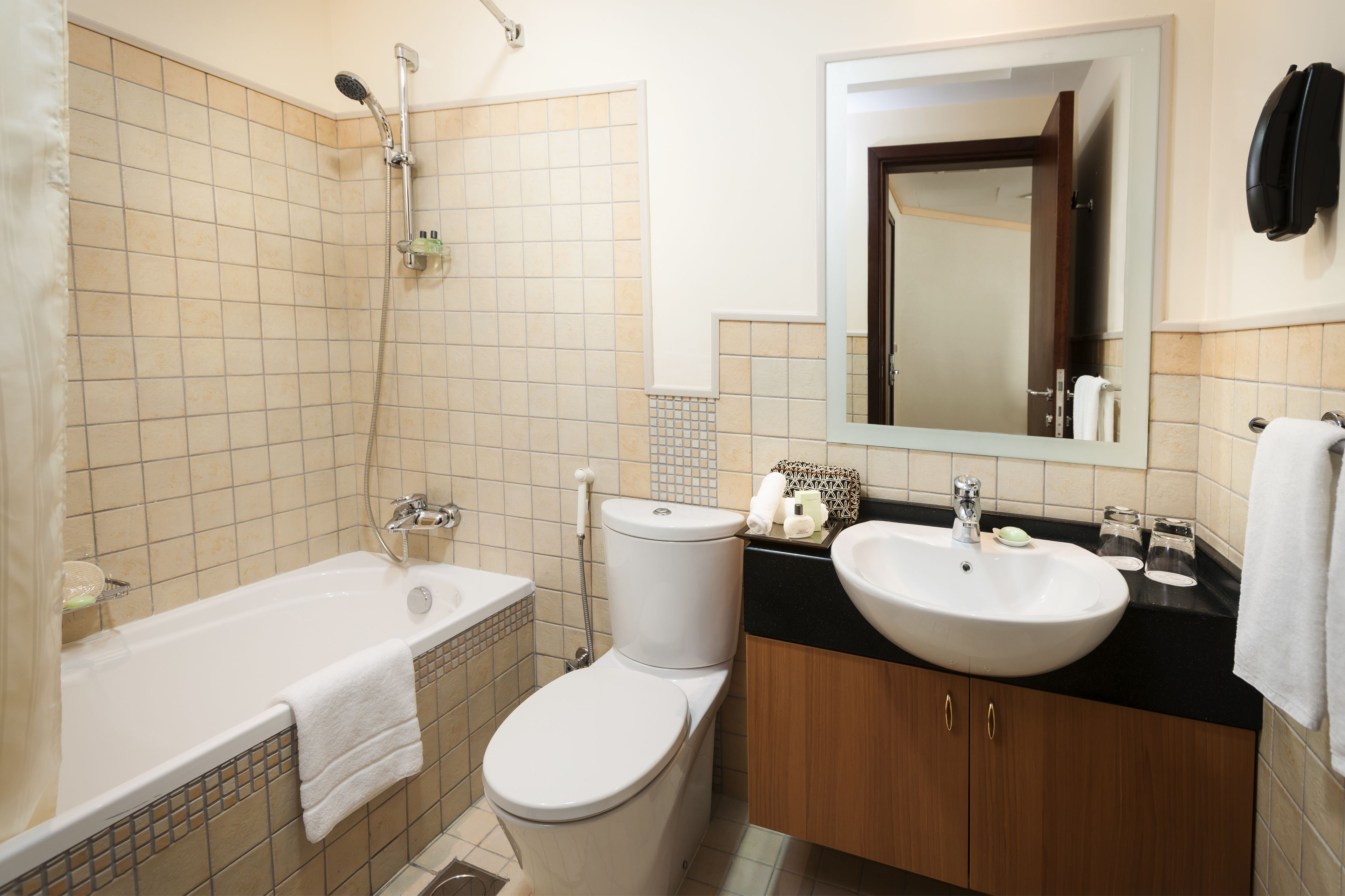 combined shower/bathtub, deep-soaking bathtub, designer toiletries