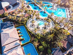 Indoor pool, seasonal outdoor pool, pool umbrellas, sun loungers