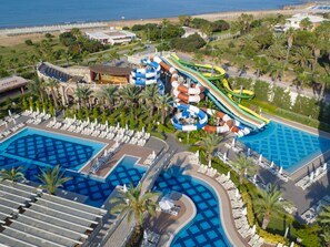 A resort with multiple swimming pools, a water park, and a beach area. - Royal Alhambra Palace – All Inclusive (Manavgat)