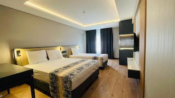 Standard Triple Room | Minibar, in-room safe, soundproofing, free WiFi